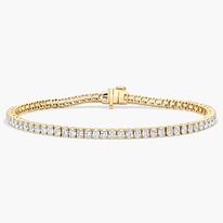 Oval diamond tennis bracelet in 14k yellow gold